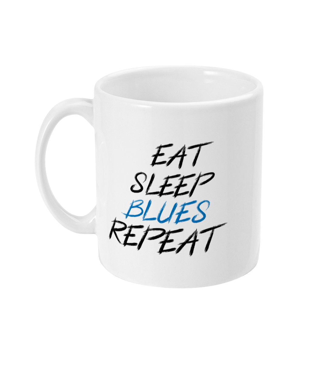 "Eat, Sleep, Blues, Repeat - Chelsea 11oz Mug," ceramic with a glossy white finish, ideal for tea or coffee-loving Chelsea supporters.